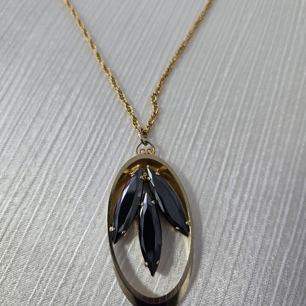 Avon Gold Necklace with Black Leaf Accents